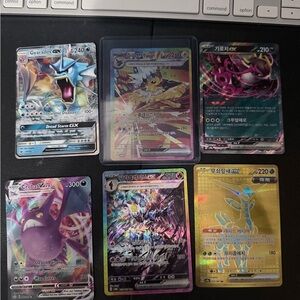 Pokemon Card Collection - Blue, Yellow, Pink, Gold